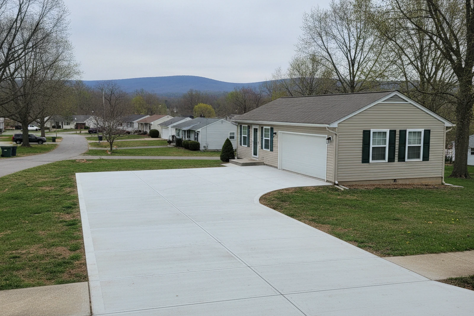Finished dry residential concrete driveway replacement Altoona Pennsylvania Blair County broom finish no people on wet concrete