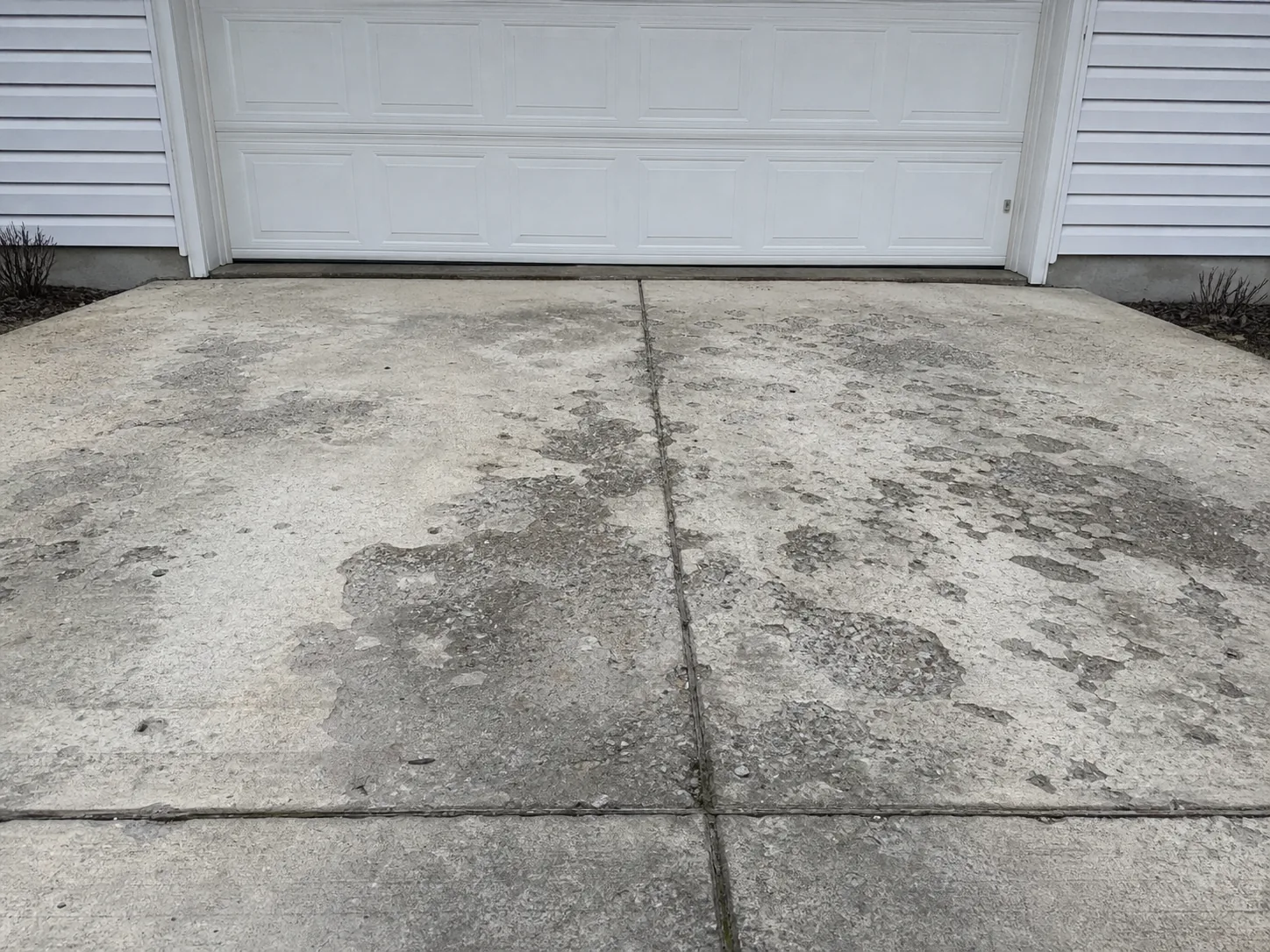 Concrete driveway Hollidaysburg Pennsylvania Blair County PennDOT road salt damage residential Joe